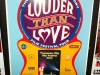 LOUDER THAN LOVE TCFF poster designed by Gary Grimshaw